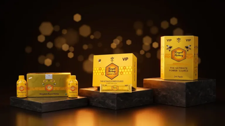 Royal Honey VIP Shot, 12 Pack and 24 Pack standing on three dark stone steps, each in its own pool of warm light
